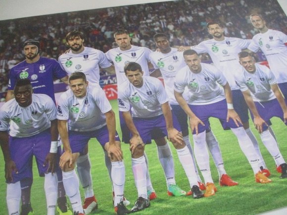 The portraits of late Hungarian legendary soccer player of Budapest Honved  and Real Madrid Ferenc Puskas are seen on the jerseys of players of  Diosgyoer before the start of a match of