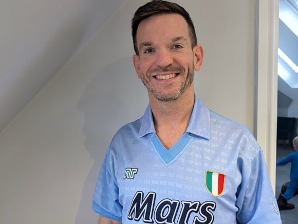 Will Hogg wears a Napoli shirt of the Maradona era